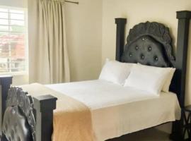House - Sleeps 4 & Free Parking, hotel en Discovery Bay