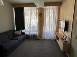 Rooms Hotel Kokhta Apartments, allotjament vacacional a Bakuriani