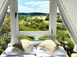 Design Chalet Vulkaneifel, хотел с паркинг в Kerschenbach