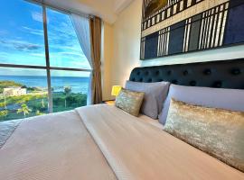 Two 2 bedrooms condos for up to 10 people, hotel con estacionamiento en Lapu Lapu City