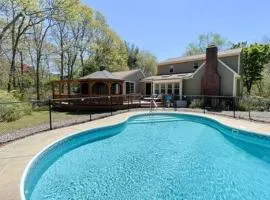 Tranquil Home with Pool, Fireplace, and Game Room Hosts 10 in Family Friendly 4 Bedroom Home with Seasonal In Ground Pool, Ample Parking, 24 Hour Hospitality, Walk to Local Restaurants
