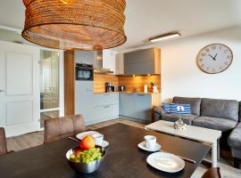 Appartement Amelanderoase 82 im Amelander Paradijs, alojamiento con cocina en Buren