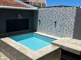 Casa agradável com pequena piscina !