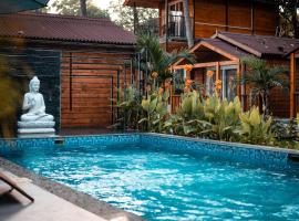 Tranquill Riverside Luxury Cottages With Bathtub, Candolim, hotel in Candolim