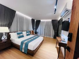 Box A.venu, hotel com banheiras de hidromassagem em Calapan