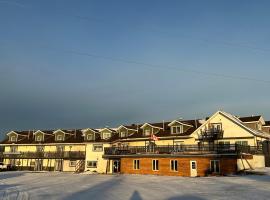 North Adventure Inn, hotel cerca de Polar Bear Habitat Heritage Village, Cochrane