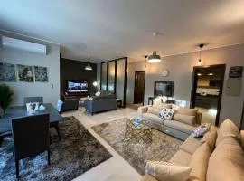 Lovely 2BR Apartment with Garden and Barbecue Area