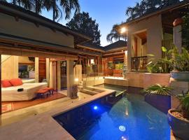 Paradiso Pavilion - An Intimate Bali-style Haven, villa à Port Douglas