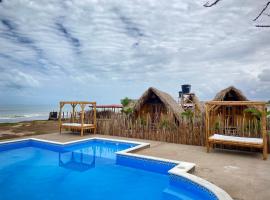 Zemu izmaksu kategorijas viesnīca Guajira Beach pilsētā Rioača