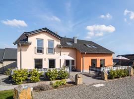 Holiday home with terrace near volcanic lakes, family hotel in Ellscheid
