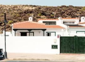 Acogedora casa en Abades en tranquila urbanización, hôtel à Abades