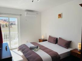 Coral Cove Comfort Room 1, hotel i San Pawl il-Baħar