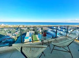 Amazing seaview studio with pool-steps away beach