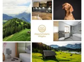 Allgäuer Alpenchalets "Ferienhaus mit Holzkamin und Garten" sowie eine malerische Ferienwohnung mit Balkon und Bergblick perfekt für Hundeliebhaber