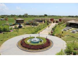 Unique Resort And Restaurant, hotel with parking in Porbandar