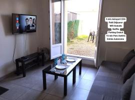 Appartement 2, Jardin, collation, 5 min de l'aéroport CDG, hótel í Le Mesnil Amelot