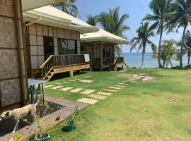 Brīvdienu māja Villa Malinao Oceanview Resort - Deluxe bungalow pilsētā Burgos