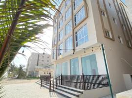 DHAREEZ BEACH HOTEL, aparthotel v destinaci Daḩārīz