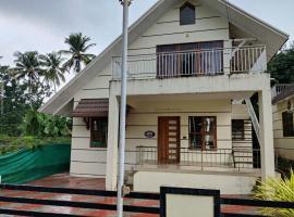 The Royal Nest Villa, hotel with pools in Athirappilly