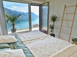 Dreamview Retreat - Breathtaking Lake Views, апартамент в Krattigen