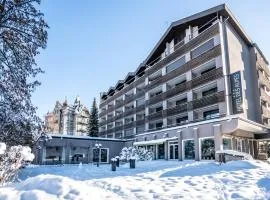 Studio im Hotel Des Alpes