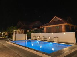 Jasmine Villa, hotel romántico en Pantai Cenang