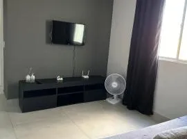 Apartamento novo ao lado do Rio Centro!