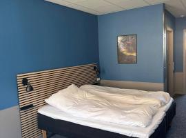 Km City Room 7, bed and breakfast en Saeby