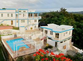 Humacao Villa - 8BR, Pool, Palmas, Ocean Views ค็อทเทจในComunas