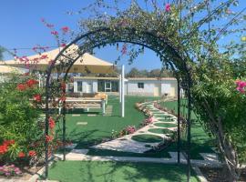 Noor Farm Stay 5BHK، كوخ في خور فكان