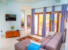 One bedroom appartement at Au Cap 100 m away from the beach with enclosed garden and wifi โรงแรมในAnse aux Pins