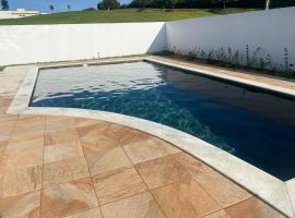 Casa com piscina Riviera, hotel in Itaí