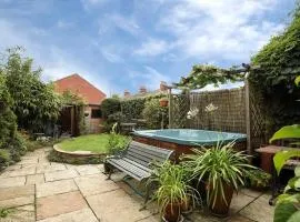 Large character home, hot tub, beach 5 min walk