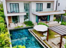 Villa familiale avec piscine, hytte i Tamarin