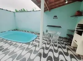 Casa 35 Praia Grande com piscina e 3 dormitórios