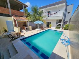 casa c/piscina enseada guaruja, cottage in Guarujá