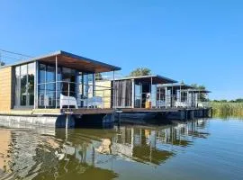 Houseboat in azy by Lake Jamno and Sea