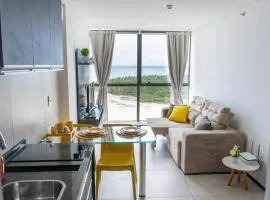 Apartamento com Vista Deslumbrante à Beira Mar.