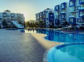 Superbe appartement au centre de Cabo Negro en résidence avec piscines et tobogans