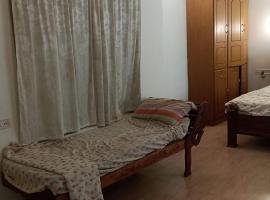 VISHNU HOME STAYS, hotel with parking in Trivandrum