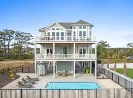 Coastal Charm Ocean Isle Beach custom beach home with 4 bedroom, 3 bath home with pool and elevator