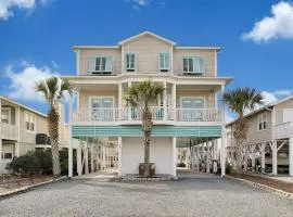 Doin` Time Canal Front home with elevator and extra living room