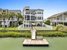 Latitude Adjustment by Brunswick Vacation Rentals Canal front with dock
