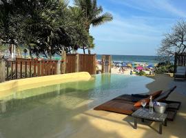 Casa Canoa Hotel Boutique à Beira-mar com Piscina e Café da manhã, hôtel à Guarujá