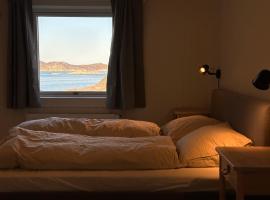 Grand seaview house Ilulissat، كوخ في إيلوليسات