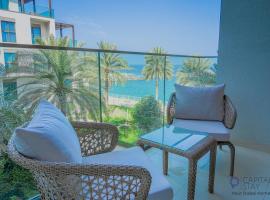 Two Bed Apartment and Maid Room - The Address Beach Resort Fujairah, хотелски комплекс в Фухайра