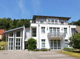 Exklusives Penthouse mit Dachterrasse, hochwertig ausgestatteter Küche mit Dampfgarer, inklusive 2 Stellplätze und Fahrradgarage, hotel in Kulmbach