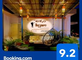 iKyam (The Backpackers Hostel/Homestay), παραθεριστική κατοικία σε Madikeri