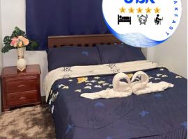 JBR Cozy Bed & Breakfast, quarto em acomodação popular em Cebu