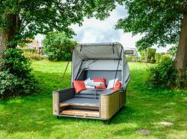 Outdoor Lounge am Belauer See mit Seezugang, alojamento para férias em Belau